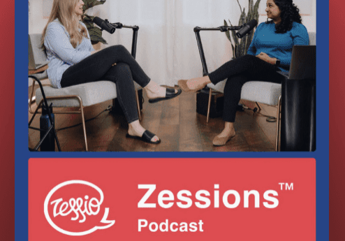 Two women engaged in a podcast recording session.